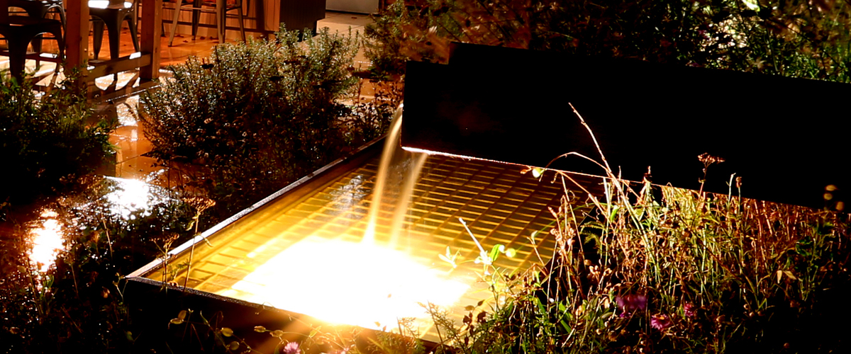 Consider lighting from below when designing a new water feature